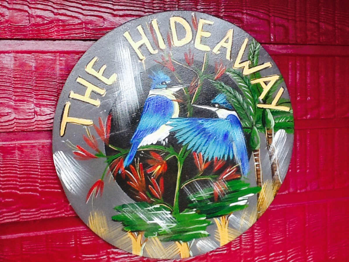 Photo of property: The Hideaway sign.