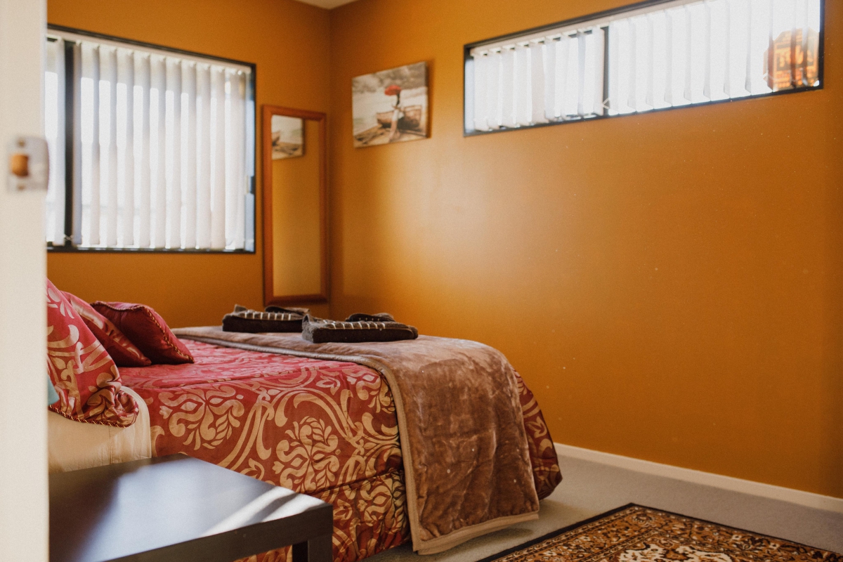 Photo of property: Bedroom with queen bed