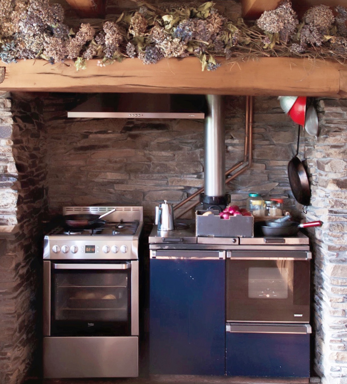 Photo of property: inglenook fireplace in kitchen