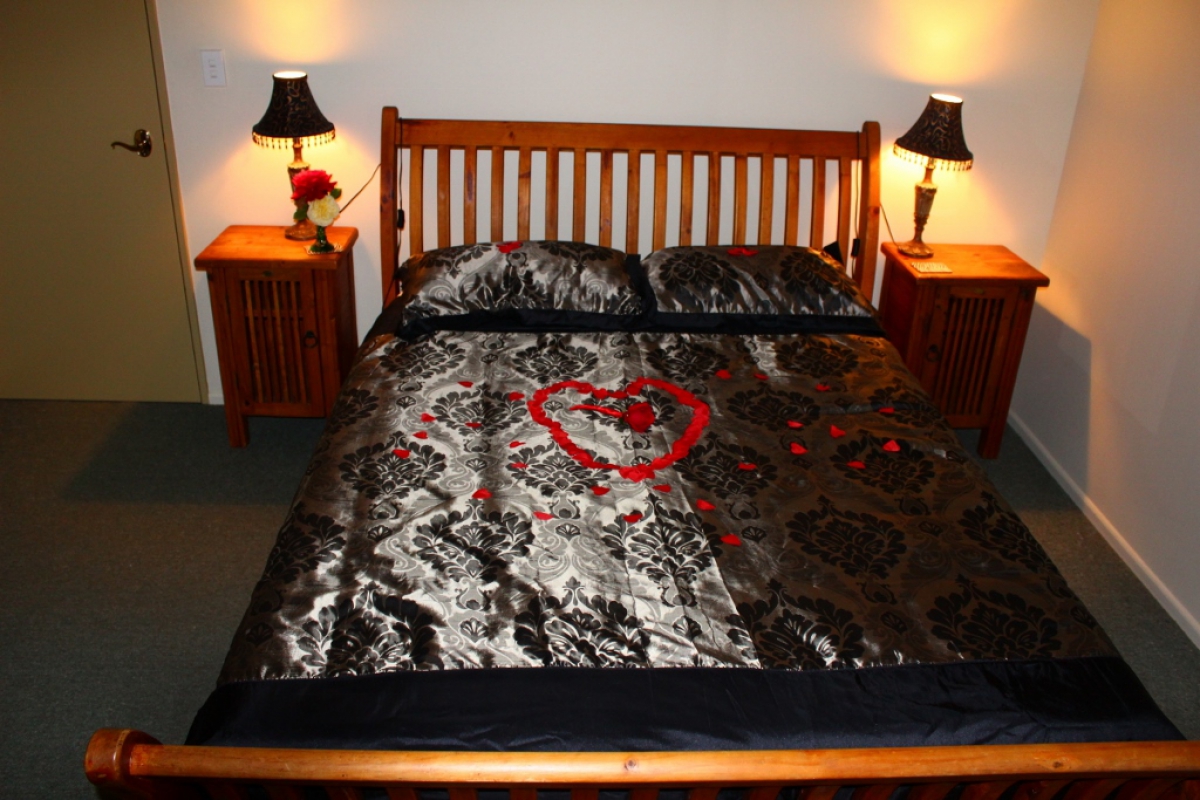 Photo of property: River Retreat Master Bedroom