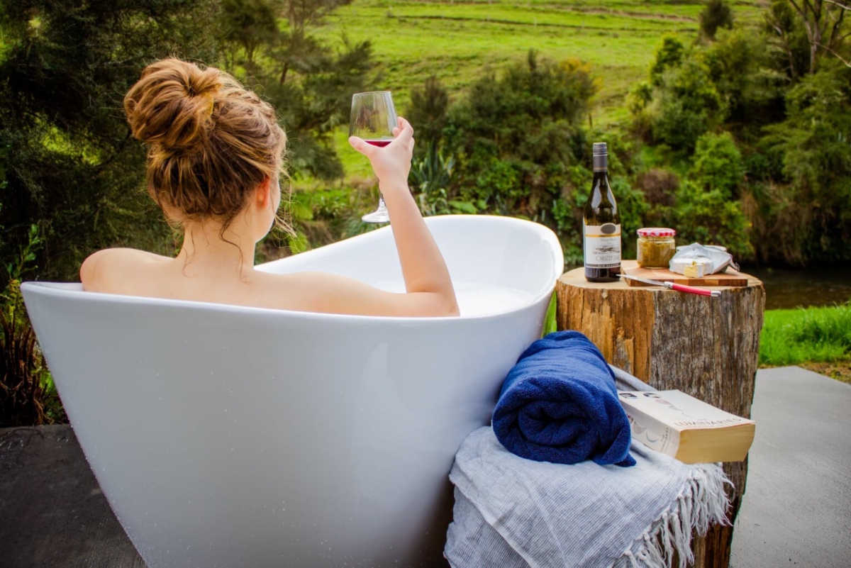 Photo of property: Enjoy a glass of wine in the stunning outdoor bath with beautiful views over the river to the farm land beyond.