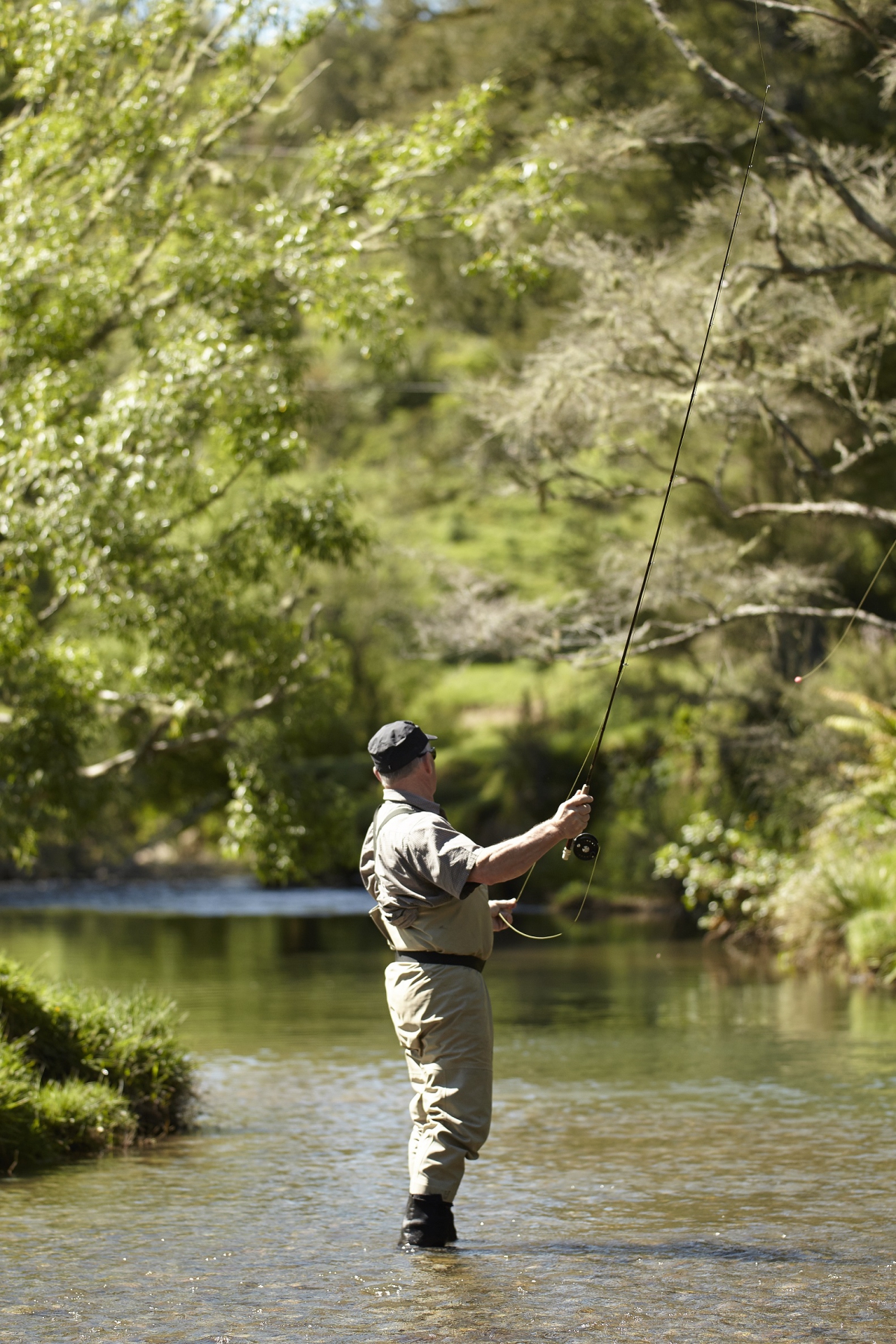 Photo of property: The rainbow and brown trout are plentiful in our river and you can catch them from the front lawn. Just bring your own rod and have a valid NZ fishing license.