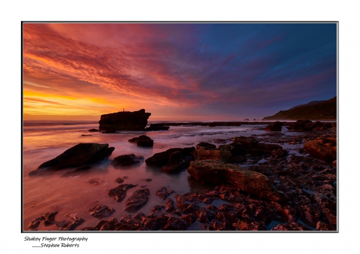Photo of property: firey sunset off the rocks at Breakers Boutique accommodation