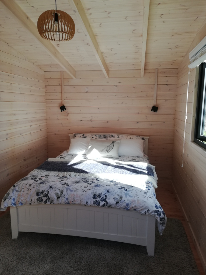 Photo of property: Main bedroom in Cabin - Queen Size Bed