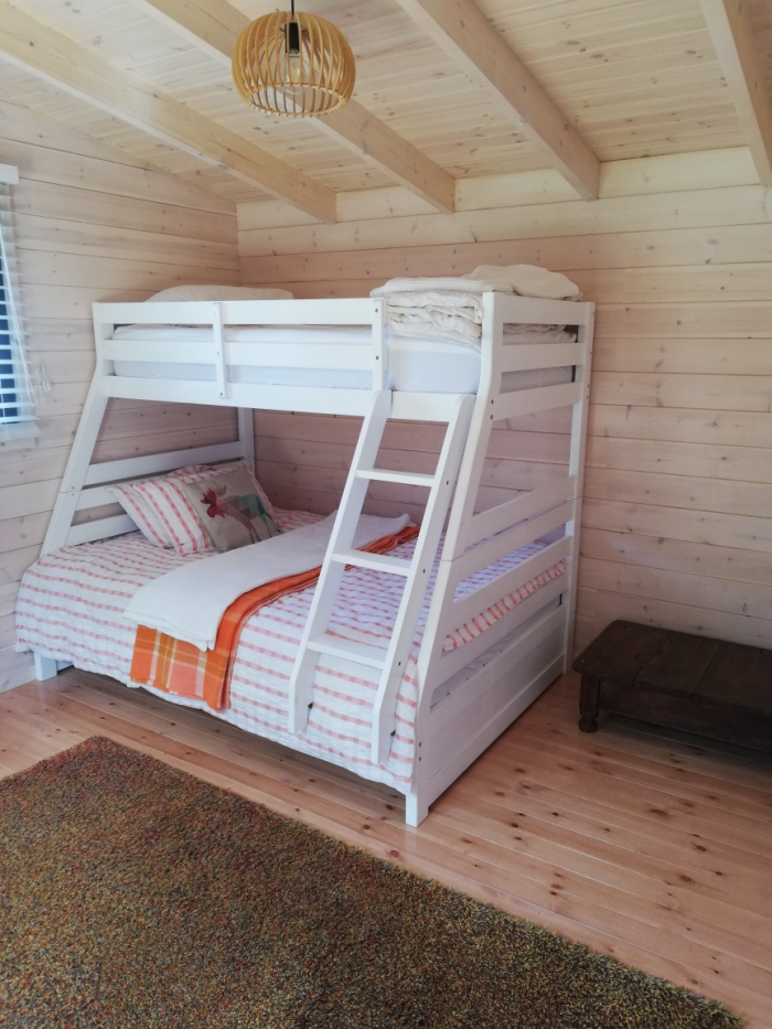 Photo of property: Cabin provides extra sleeping with Bunk Bed
