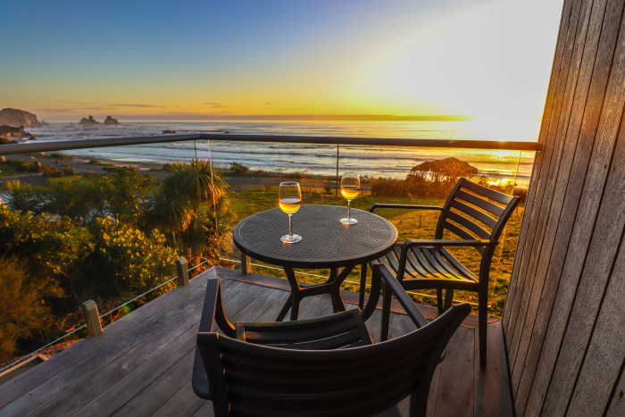 Photo of property: Relax and unwind in your own private space overlooking Motukiekie Beach on the Great Coast Road
