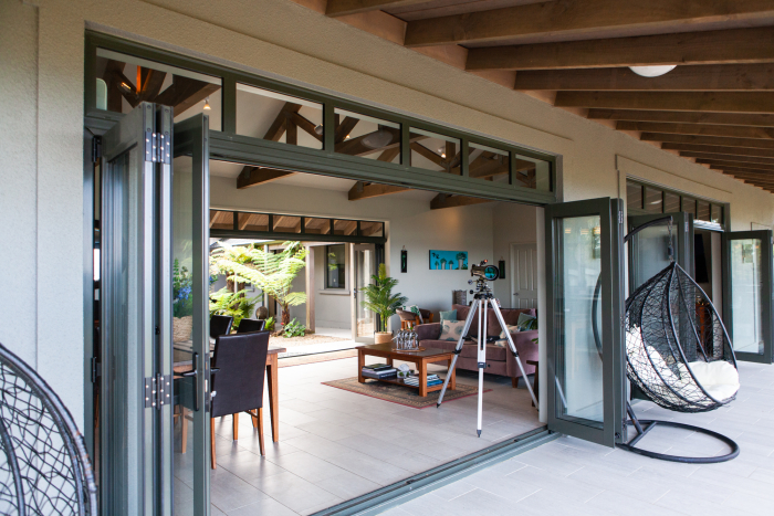 Photo of property: Beautiful open flow from living area to deck