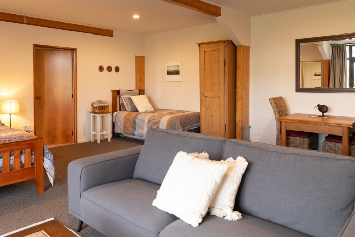 Photo of property: Downstairs bedroom, 1 queen, 1 king single with rollaway single