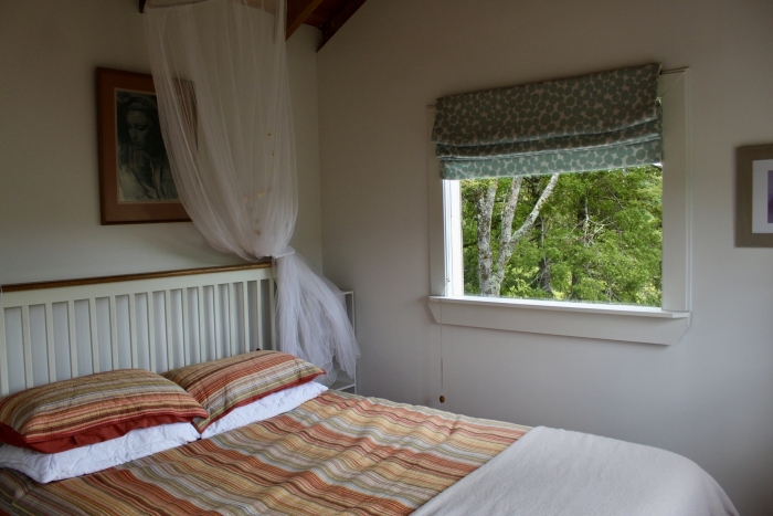 Photo of property: queen bed with views