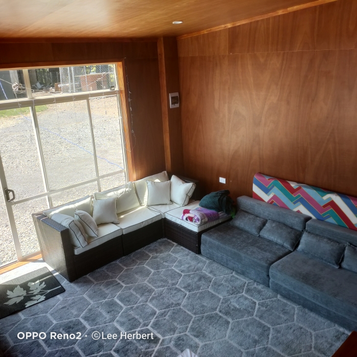 Photo of property: We now have an extra room/lounge area for extra guests to sleep or to just relax or play games or read 