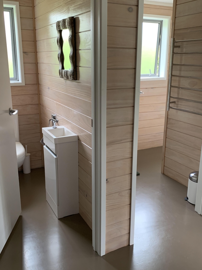 Photo of property: Separate toilet and bathroom with shower. 
