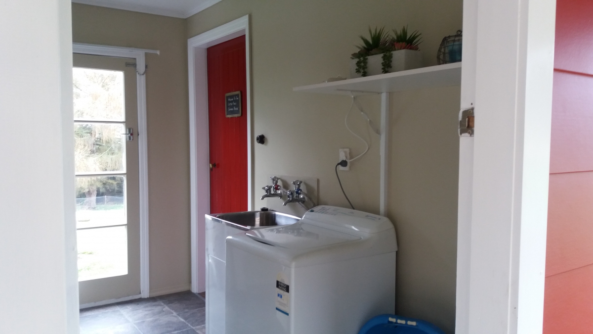 Photo of property: Entrance and laundry room