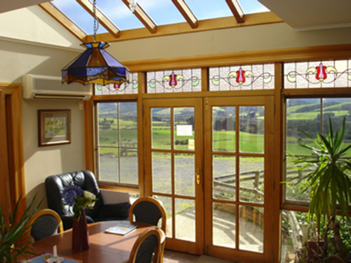 Photo of property: Dining room with french doors