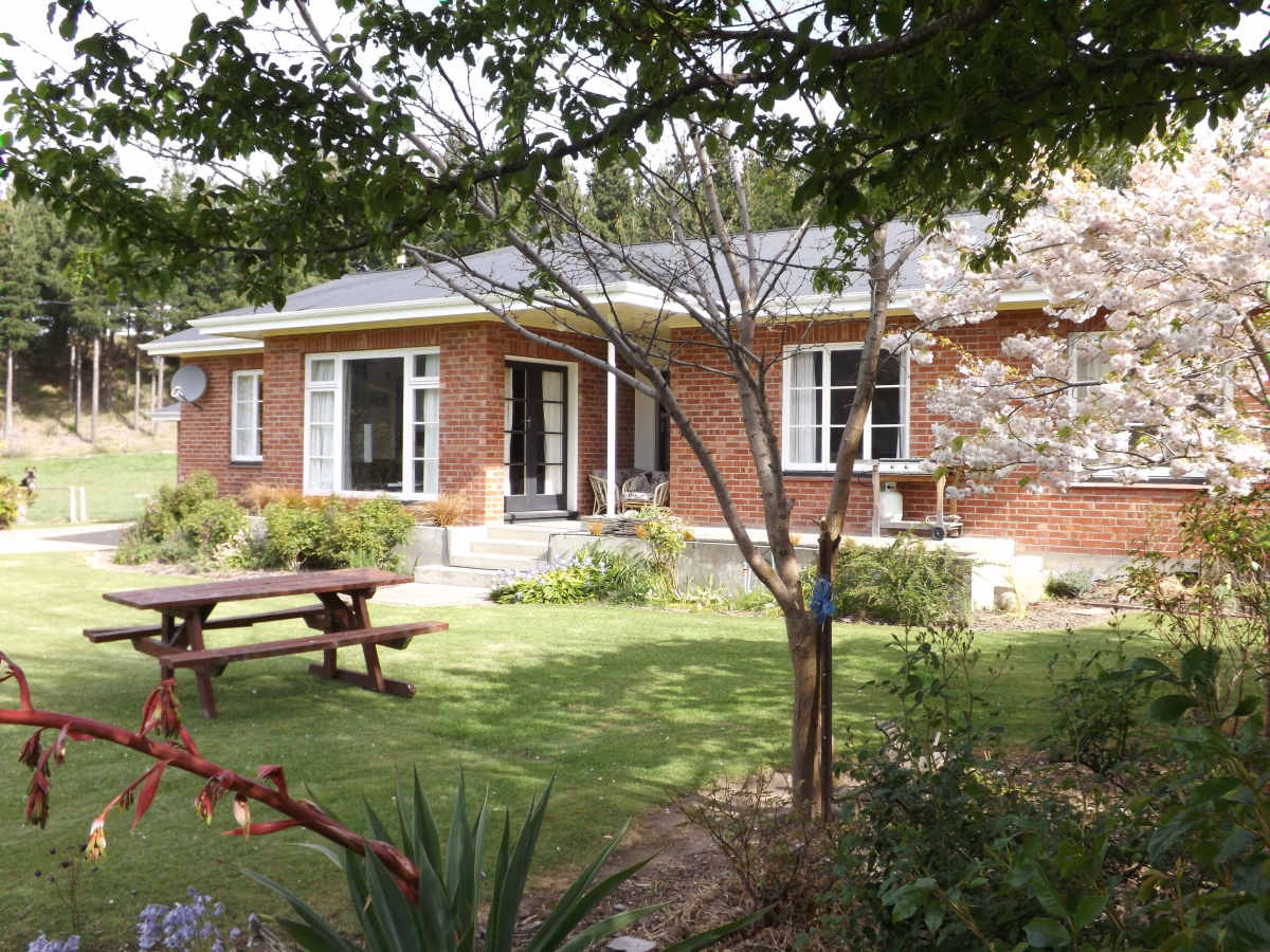 Photo of property: garden and the farm cottage